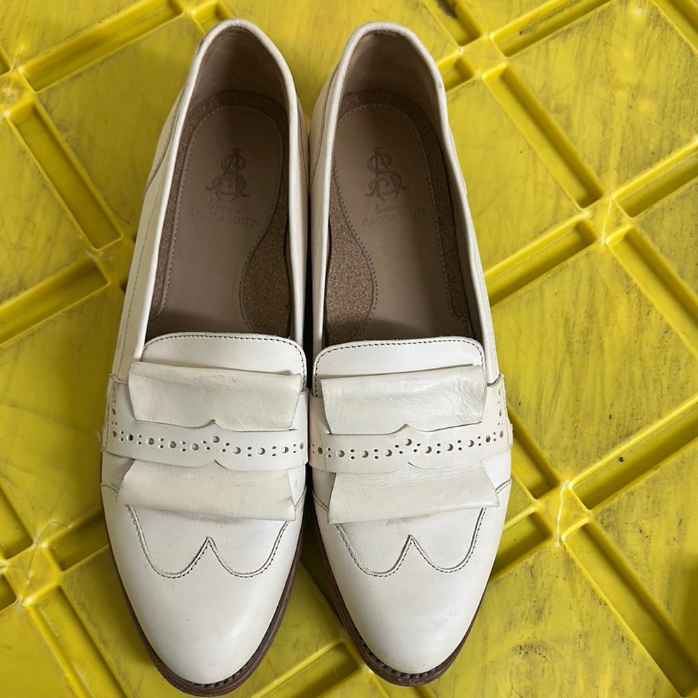 Cream Penny Loafers with Perforated Design